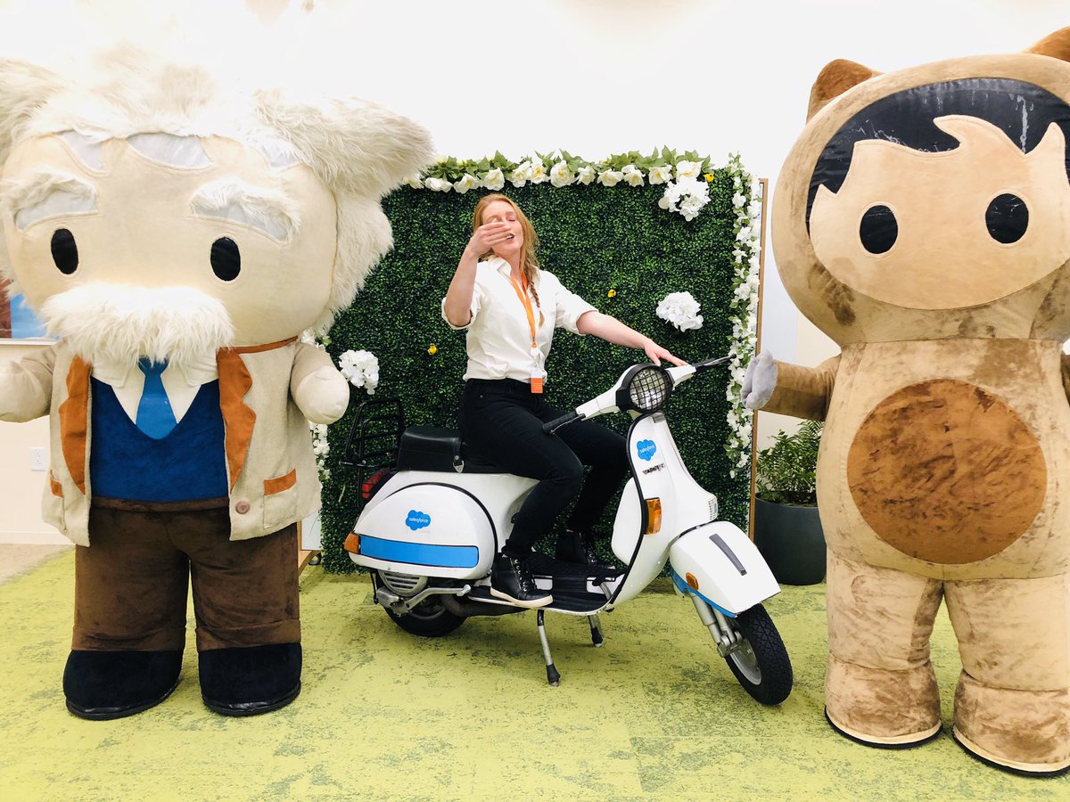 blowing kisses on a Vespa at the Salesforce Tower in NYC, alongside Einstein & Astro mascots! photo by Rob Legacy