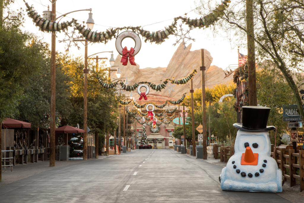 Pixar's tweet photo. There’s snow place like Cars Land for the holidays! Swing by @Disneyland Resort for more merry goodness. https://t.co/4NqZJLviVj