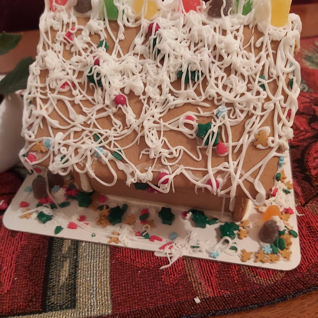 So I cheated a little by buying a premade gingerbread house, but had fun decorating it with my mom on my last night before I fly home in the morning. A day late for the  <a href="/CozyReadathon/">The Cozy Little Readathon</a> due to having the flu but glad I could still participate. 

#tistheseason🎄 #GingerbreadHouse