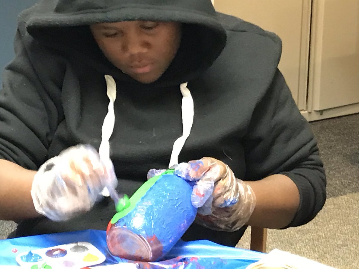 Painting cake jars is a favorite makerspace activity in December.