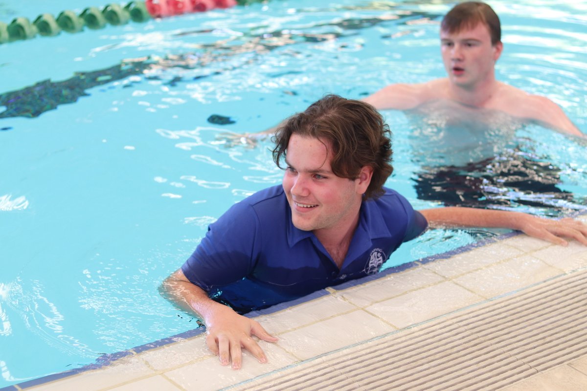 Holy_Cross_Coll's tweet photo. Some of the best sporting moments are not because of a team winning or losing, but of personal triumph. Wheelchair bound by land, but not in water, there was a standing ovation at our Interhouse Swimming Carnival for this young man. https://t.co/C63FRm6khG