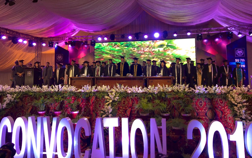 UOS_edu's tweet photo. The #academicProcession of #SUconvocation19 comprising the Pro-Chancellor @RajaYassir_PTI, VC @ahmadishtiaq, and other #SUdignitaries marches to the stage. https://t.co/teXjB4tPqD