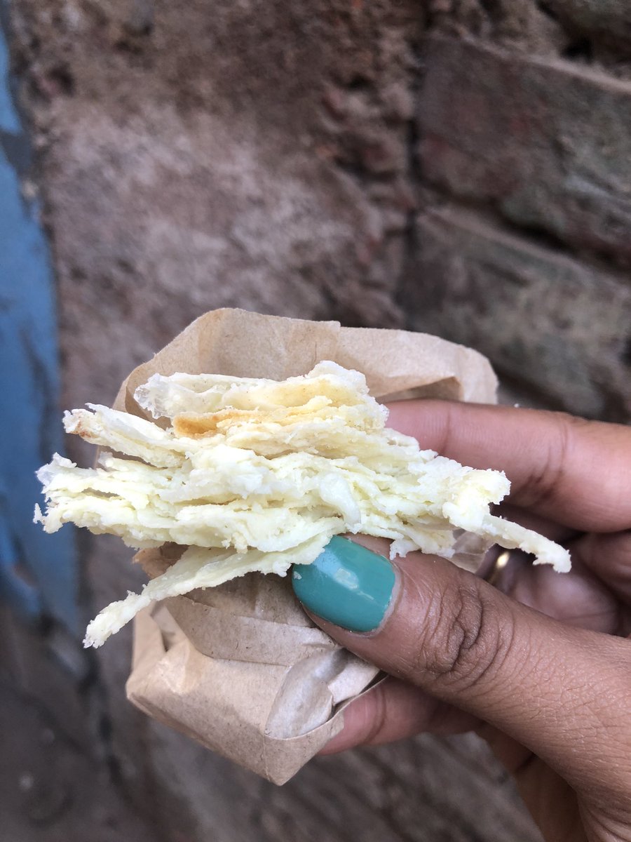 historywali's tweet photo. After a lovely Langar at Patna Sahib, this is the first thing we ate in the city. A tiny no-name shop in ‘Kachori Galli’ close to the Gurudwara make this Khurchan, layer upon layer of milky goodness. Just ask for Khurchan-waale they said. 
#Historywali eats #Patna https://t.co/CXEBfnCC3z
