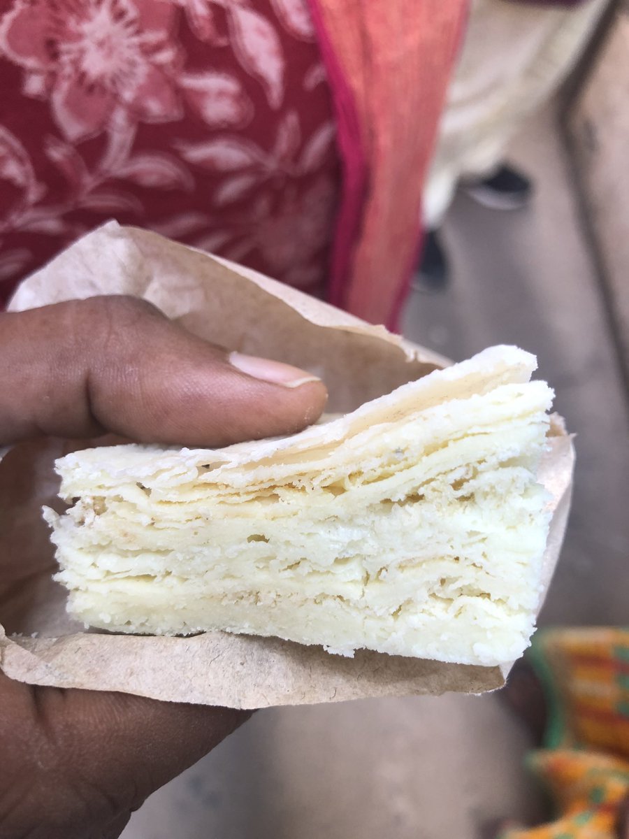 historywali's tweet photo. After a lovely Langar at Patna Sahib, this is the first thing we ate in the city. A tiny no-name shop in ‘Kachori Galli’ close to the Gurudwara make this Khurchan, layer upon layer of milky goodness. Just ask for Khurchan-waale they said. 
#Historywali eats #Patna https://t.co/CXEBfnCC3z