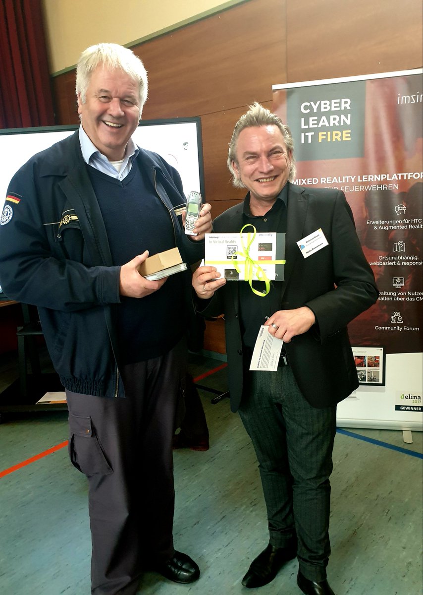 Virtual_Fires's tweet photo. @MartinZ15966415 bedankt sich bei @ABroemme für die langjährige Unterstützung mit der 3D Stereo Keynote, die Herr Broemme beim #VFC18 gehalten hat - das #imsimity Team, hat ihn als #VR Cardboard Anwendung verewigt 🤩 #digitaletransformation #educhangemaker #VFC20 @THWLeitung https://t.co/W2GZTXdMOm