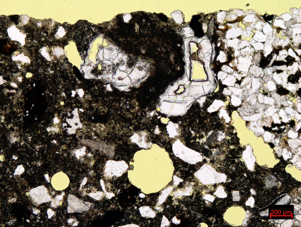 RSKPetrography's tweet photo. Another #ThinSectionThursday two-fer. This one is ASR gel in old concrete, shown in PPL and at higher mag in XPL. It's sad news for the concrete, but a somewhat exciting surprise for #petrographers to see so much of it at once. https://t.co/iBp794xOfh