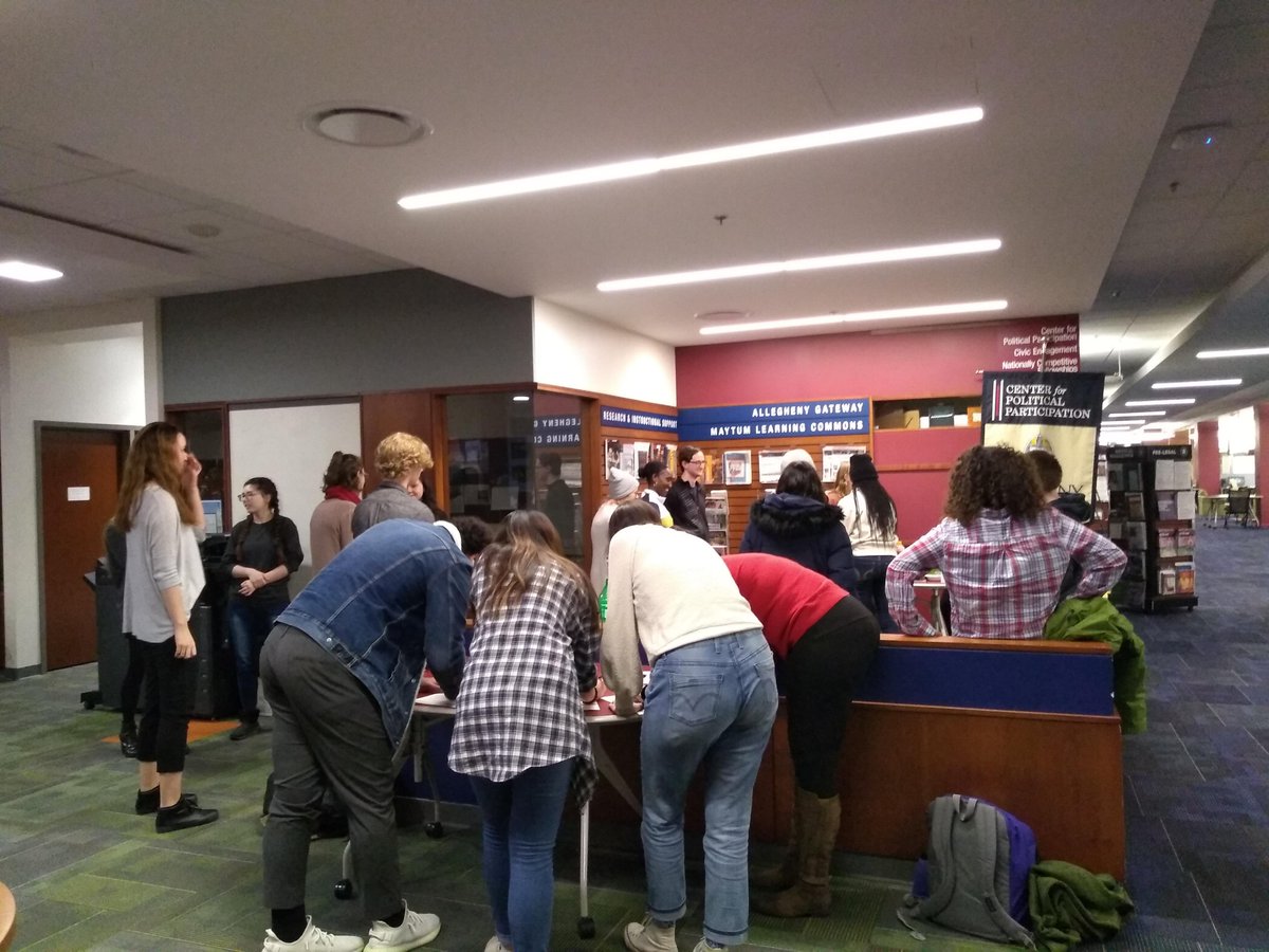 AlleghenyWC's tweet photo. Allegheny students and writing consultants celebrate the International Write-In #internationalWriteIn with a T.A.C.O.S. (thesis, assignment, citations, organization, strengths) bar! @alleghenycol https://t.co/cQFxGH3i6t