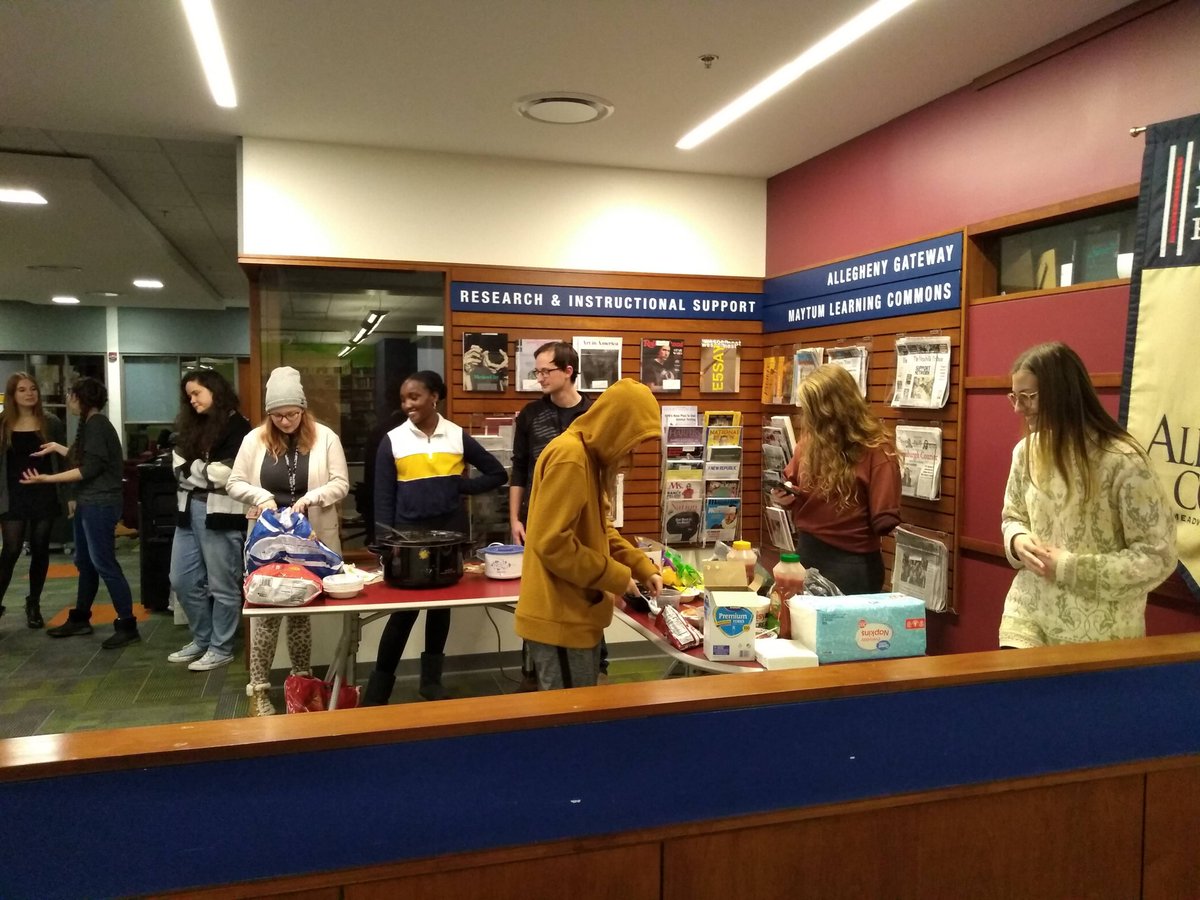 AlleghenyWC's tweet photo. Allegheny students and writing consultants celebrate the International Write-In #internationalWriteIn with a T.A.C.O.S. (thesis, assignment, citations, organization, strengths) bar! @alleghenycol https://t.co/cQFxGH3i6t