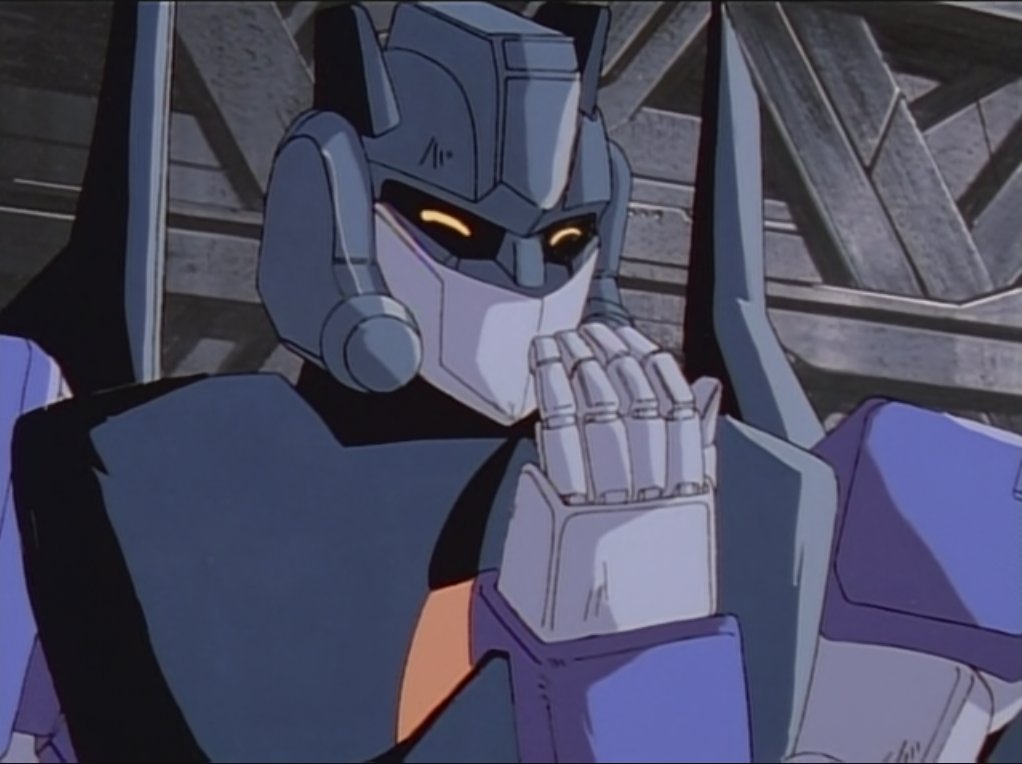 Is Starscream laughing or his he gleefully sniffing his fingers.