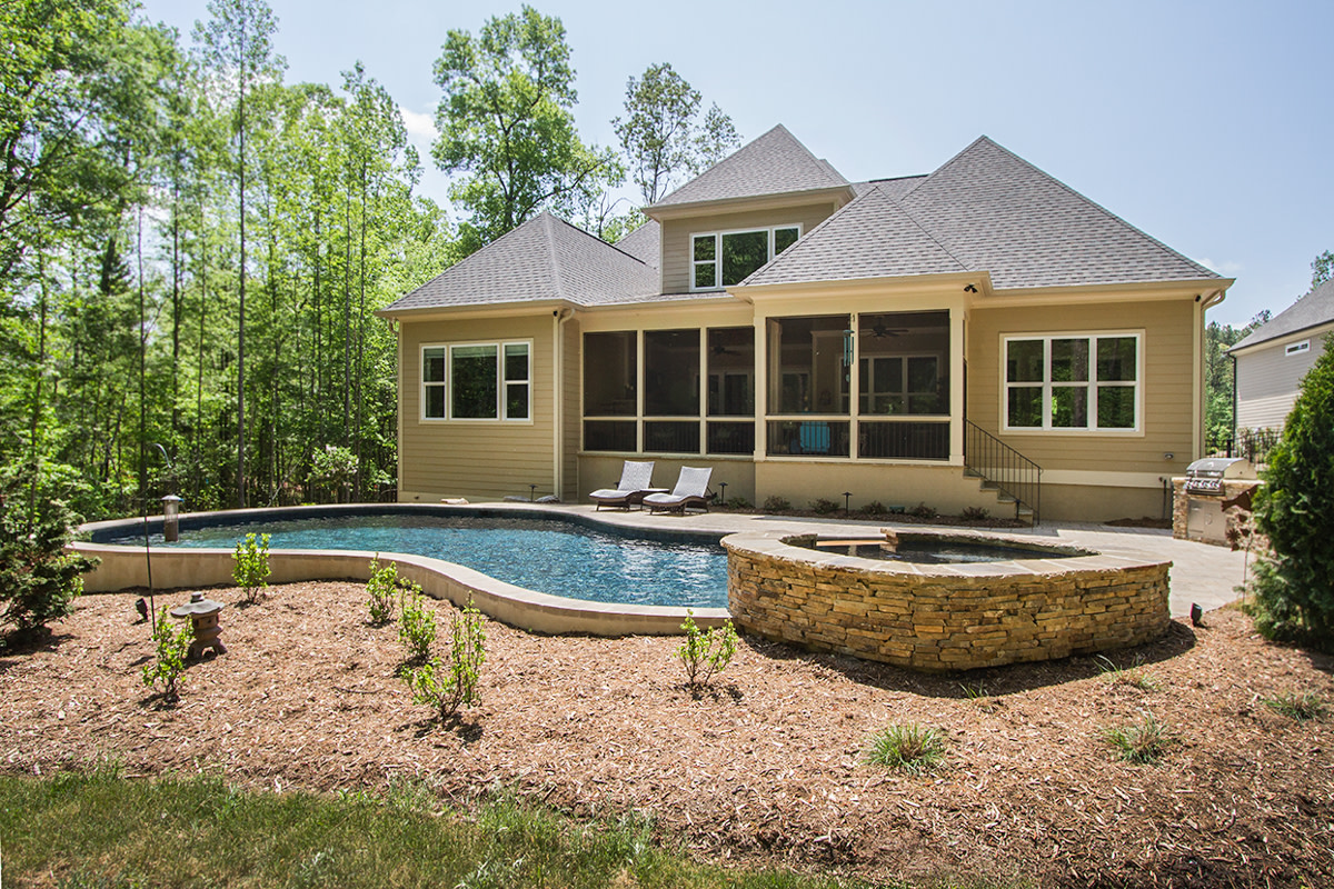BlueHavenPoolNC's tweet image. This #freeformpool &amp;amp; attached spa take advantage of the property's naturally sloping yard by utilizing the pool as a retaining wall. In doing so, we were able to include an #outdoorkitchen and grill area in the design that helps give this property a simple yet #charming appeal.