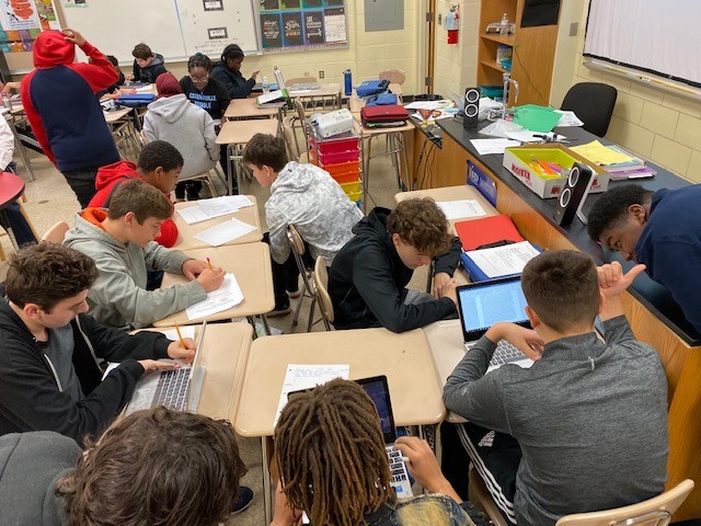 8th Grade AVID Students collaborated with a Business class to share passionate speeches, writing tips, and note-taking/presentation strategies.