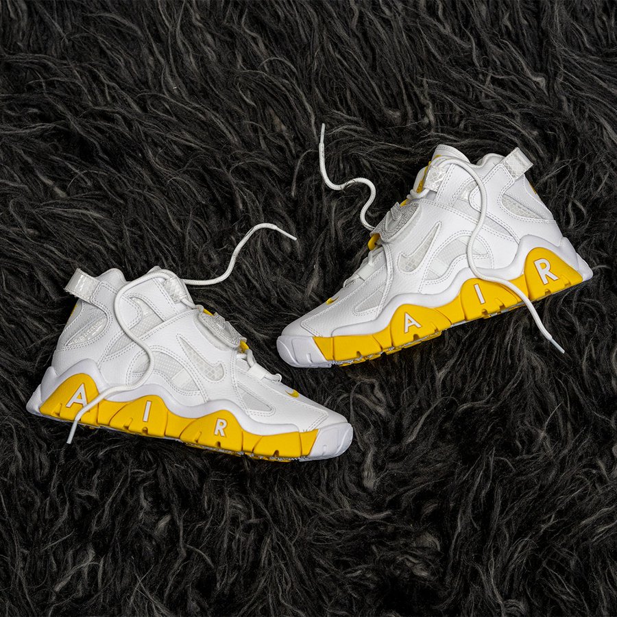 white and yellow nike barrage