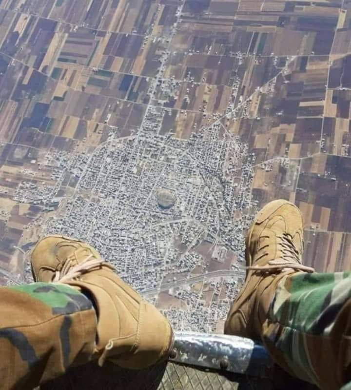 @AWSUser @Conflicts @Jake_Hanrahan Here is a photo that an Assadi soldier took by his own mobile phone dropping a barrel bomb from a helicopter over the city of KhanSheikhon just 2 months before they occupied it.