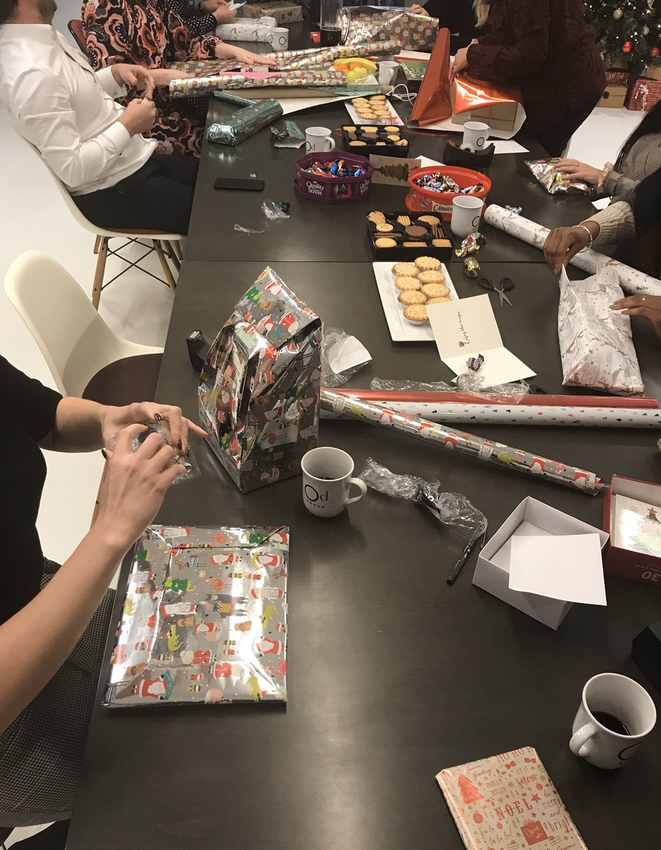 OdGroupLondon's tweet photo. The Od elves hard at work wrapping presents for @family_action #odgroup #giftinkind #familyaction https://t.co/FJCP2HsATL