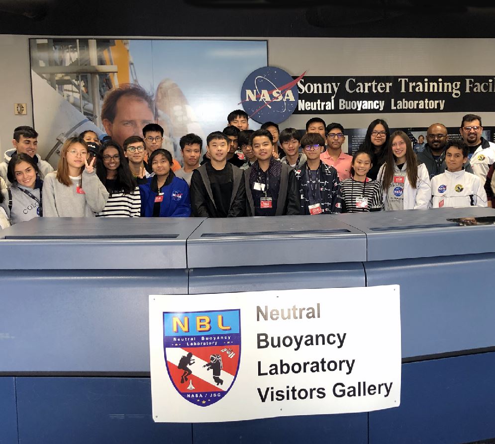 Back at the #NBL this morning with students from Colombia & Malaysia. Got to see @AstroJaws and another astronaut being suited-up & then dropped into the pool for spacewalk training. #NASA #NeutralBuoyancyLab #JohnsonSpaceCenter #SpaceCenterHouston