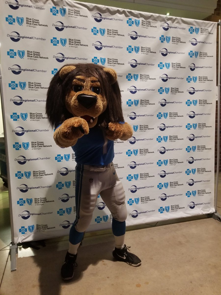 DetroitChamber's tweet photo. If you're attending the Chamber's 6th Annual State of the Region today at @fordfield, stop by the Networking & Reception area and get a photo with @Lions mascot, Roary! #DetroitPride #DETSOR https://t.co/m12N1qkR77