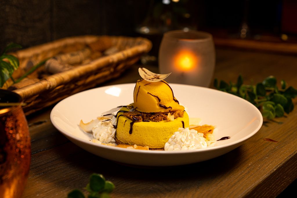 Something sweet featuring the Cheeky Cheesecake made with mango gelee, graham cracker crumble, and lime zest. #crushmgm