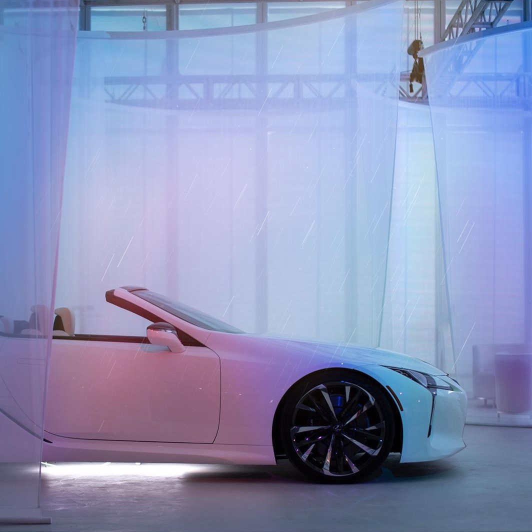 Lexus's tweet photo. Join us as the official @DesignMiami automotive partner and experience designer @naonow’s fusion of the #LexusLCC Concept as it sits under our sunshower installations. #BeyondTheRoad #LexusDesign #DesignMiami 📸: @thismintymoment 
https://t.co/wgw4Gn8Uz6 https://t.co/03G1r8cZ3b
