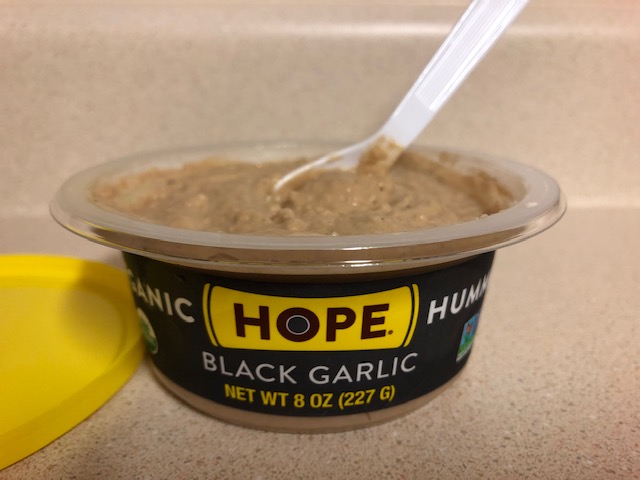 One of the best flavors in the #HopeFoods lineup - @hopehummus' #Organic #BlackGarlic #Hummus puts a delicious new twist on a classic recipe. A must-try for #garlic lovers - or for anyone who enjoys hummus. Flavor: 9.5/10 Heat: N/A (0/10)