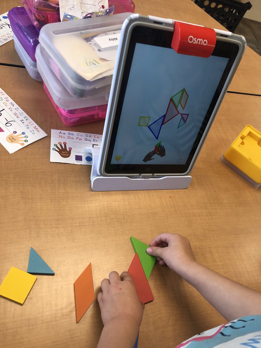 Started using OSMO in our classroom today! We are having so much fun using the tangram shapes with this interactive app! <a href="/PlayOsmo/">Osmo</a>