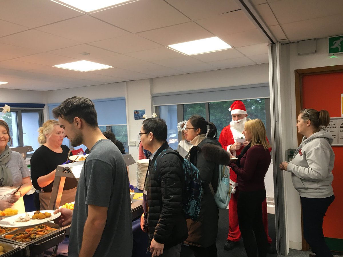 MargaretInman's tweet photo. IMH staff enjoying serving our students their Christmas dinner today @StudyUWTSD @SBS_UWTSD @THE_UWTSD https://t.co/jDihdrGiBK