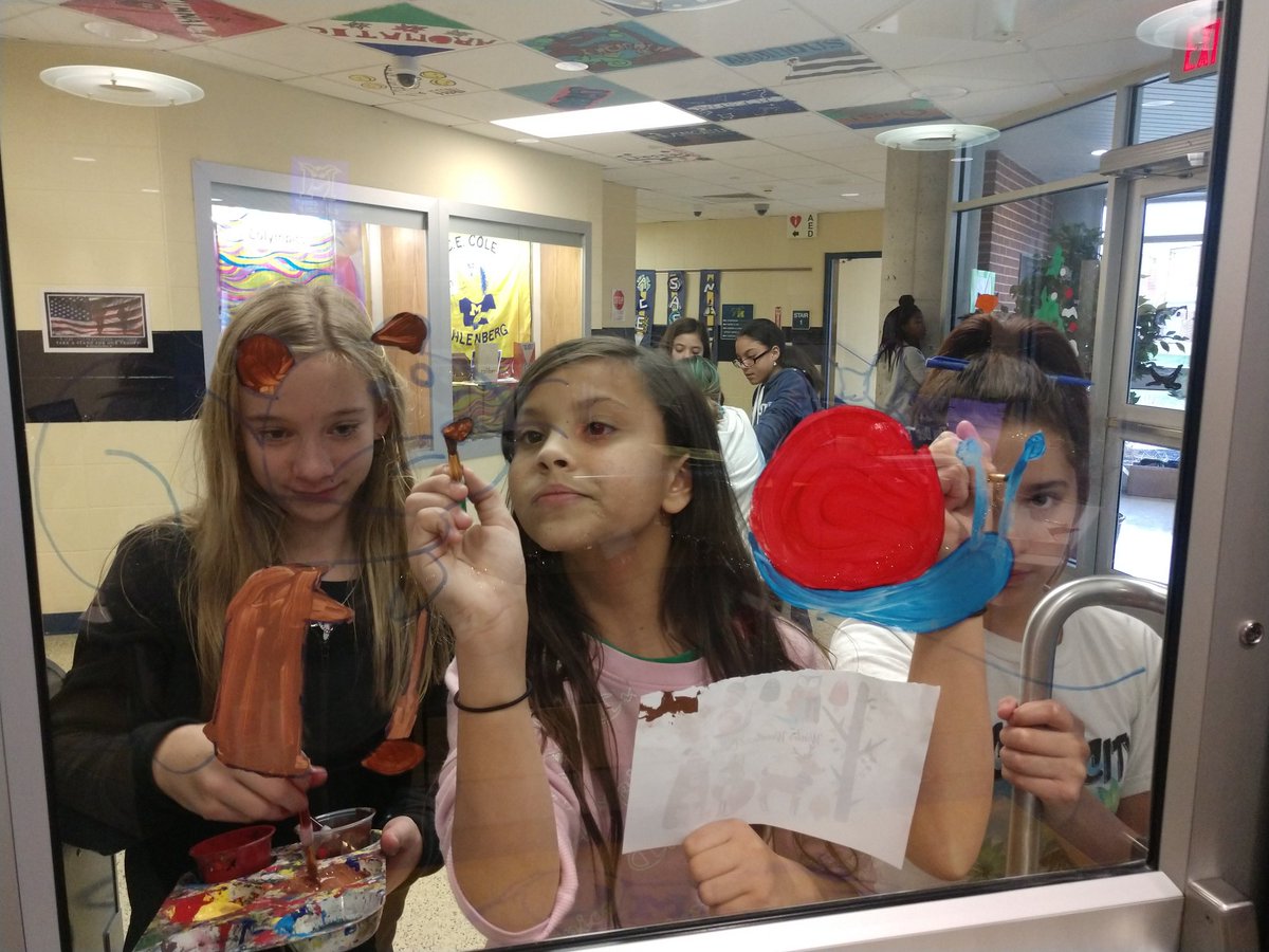 CEColeArt's tweet photo. Painting our front windows with Mr. Baylor! #makingspiritsbright @muhlsd #cecole #muralcommittee https://t.co/MQxUMAMZhE