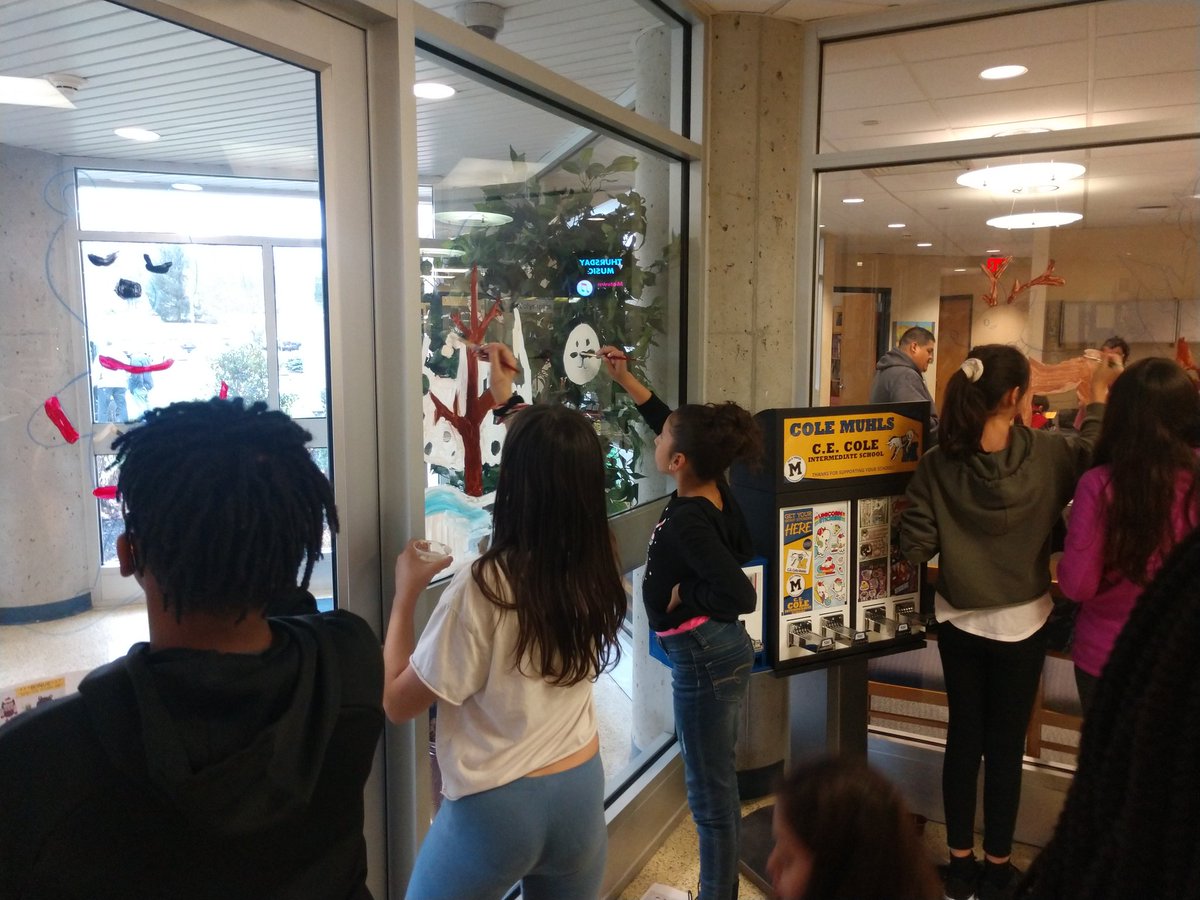 CEColeArt's tweet photo. Painting our front windows with Mr. Baylor! #makingspiritsbright @muhlsd #cecole #muralcommittee https://t.co/MQxUMAMZhE