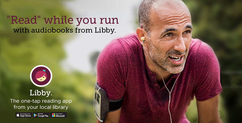 a photo of a man running and listening to his earbuds
