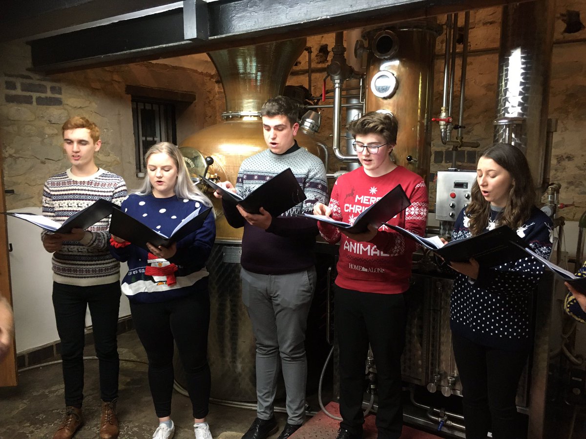 NMPATrust's tweet photo. Alumni Youth Choir members performing at the Warner’s Distillery Christmas Carols event in Harrington. Thanks for coming to represent us. #Nmpat50 #Gin https://t.co/9CqNO1gXGB