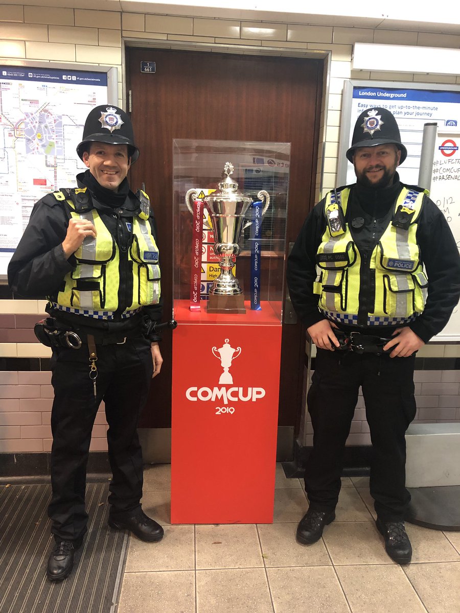 LUFCTfL's tweet photo. The ComCup TT continues at @Arsenal station tonight. Loads of supporters taking pics, incl. these 2 lol

Massive thanks to all the commuters and staff, helping to make this a reality. 

Thanks London 👊

#London #ARSENAL #TFLers https://t.co/1rVucOcXwp