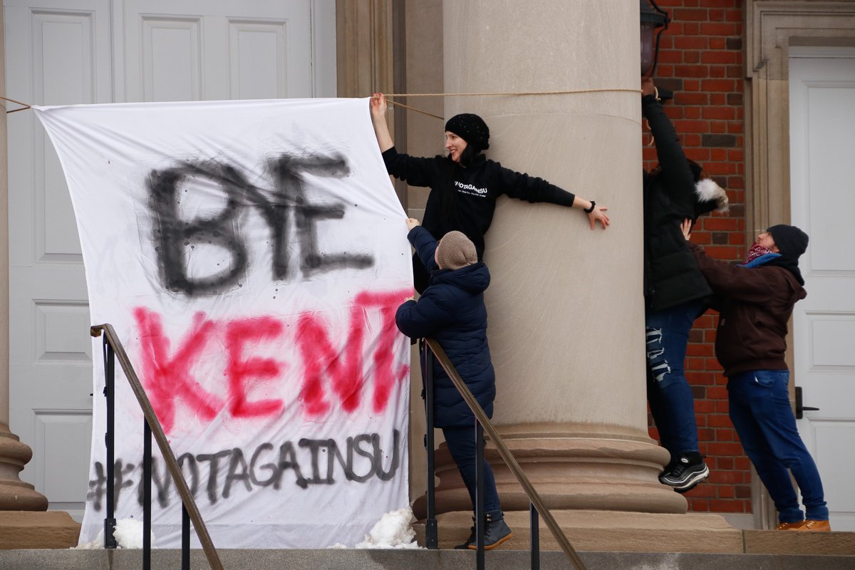 dailyorange's tweet photo. "Bye Kent": #NotAgainSU protesters delivered letters to Crouse-Hinds Hall on Thursday calling for Chancellor Kent Syverud and other officials to resign: https://t.co/4YLpiJHg9N https://t.co/UkqtSSmcqX