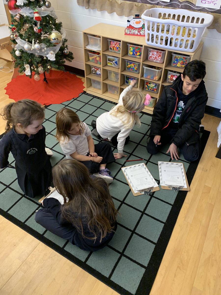QH102kinders's tweet photo. Our Reading Buddies helping us write our Letters to Santa! @QHMilton @MissL_QoH4 #qhcge #collaborativecontributors https://t.co/HAq3rl1A4t