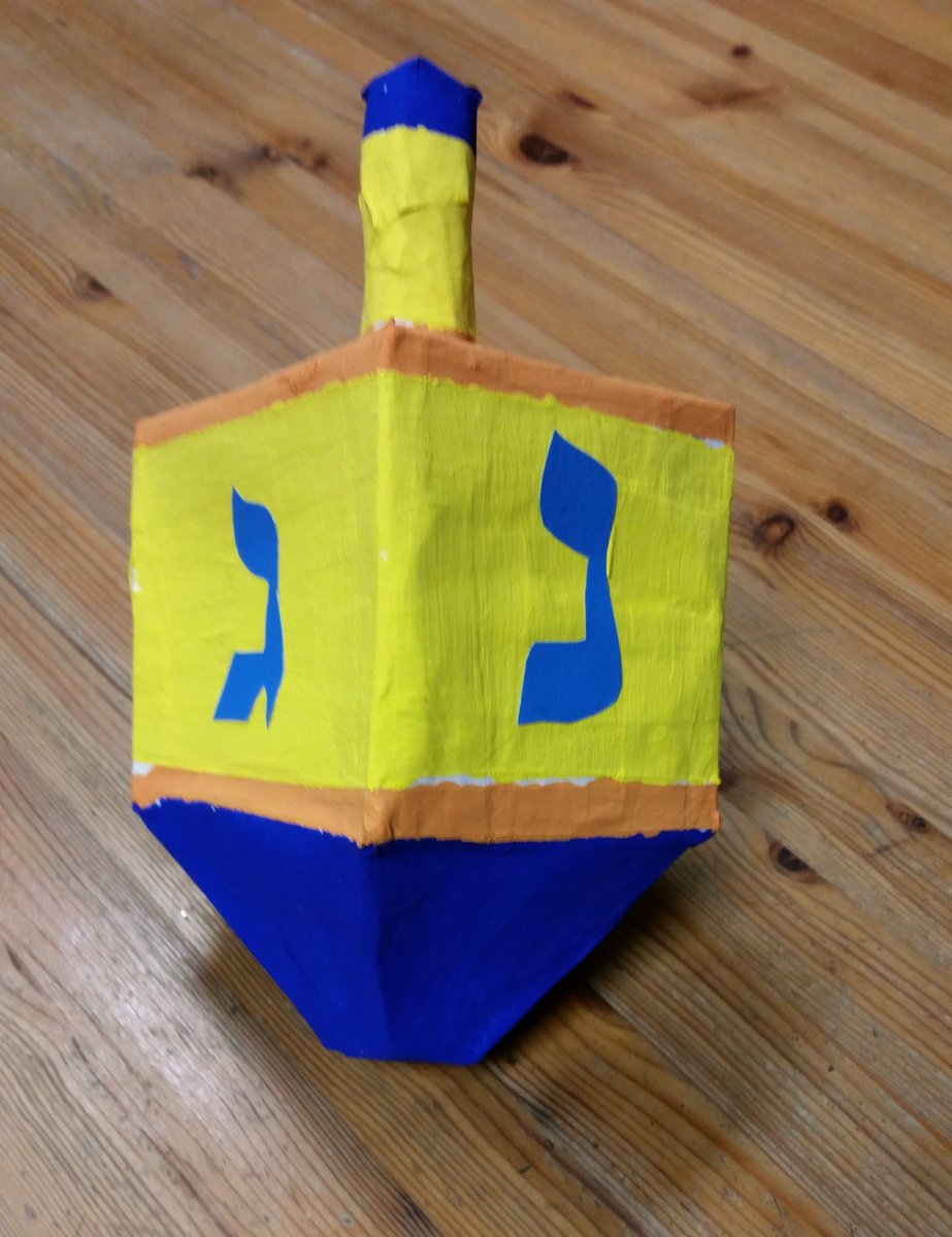 Rebecca_Beep's tweet photo. I made this big #dreidel to decorate my book display at #KatesKidBookBash on Sunday. 
https://t.co/gfYUXYkrgi https://t.co/RsSO9UZoln