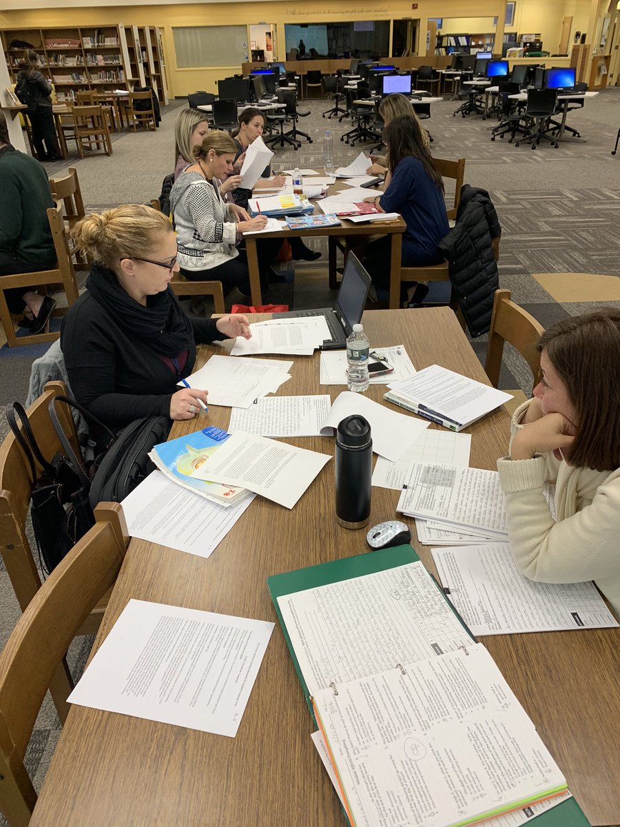 lizveneziano's tweet photo. Language Committee members examine student work against standards to pinpoint strengths and areas in need of support. Amazing to see the growth and evolution of student writers across grade levels! @woschools @BeaHanratty #WOWrites https://t.co/3RLXl66SwC