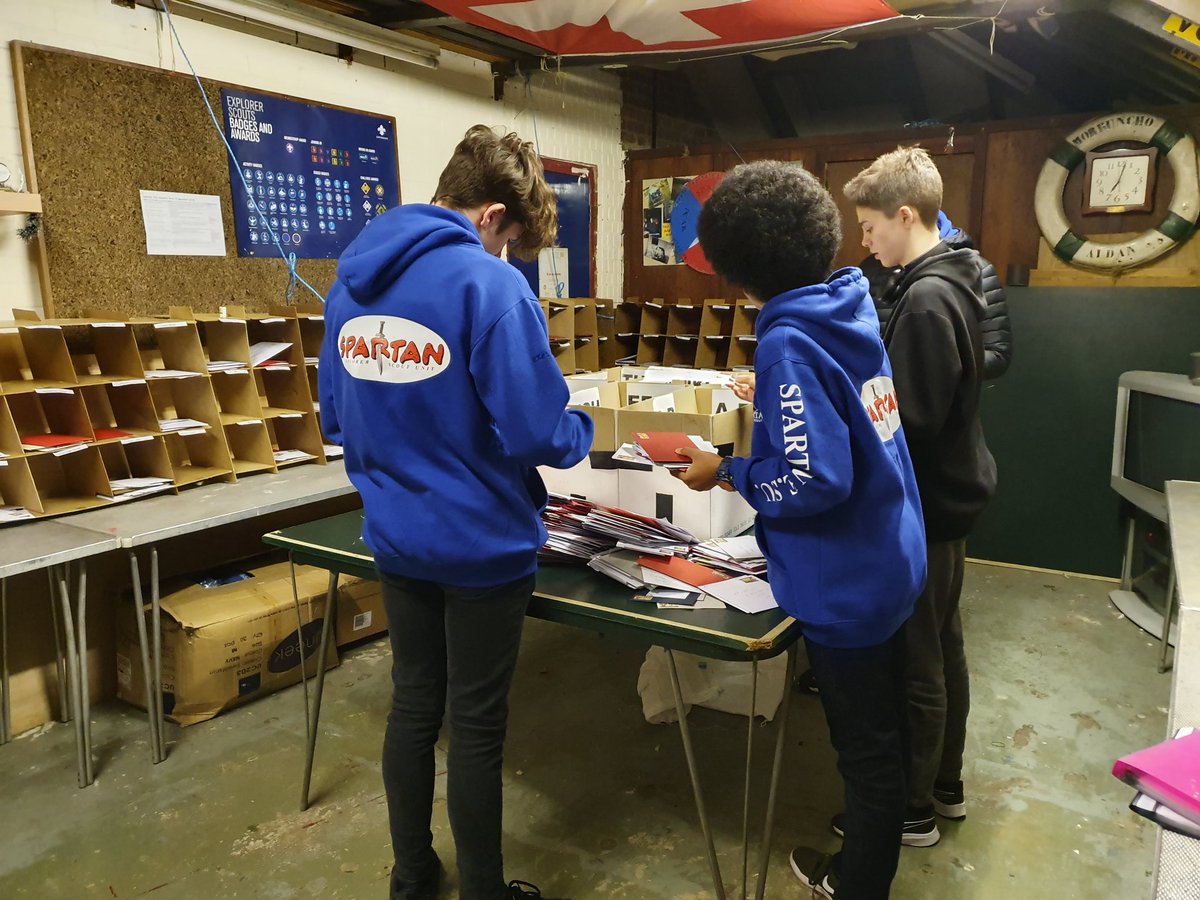 NebulaPhoenix22's tweet photo. Sorting at the 66th Derby 1st Spondon HQ last night for @stampanddeliver for the local deliveries. Well done Spartan Explorers @derbyshirescout #derbytochcamps #charity #community #SkillsForLife #supportinglocalcharities #sortingoffice #christmas https://t.co/hCFwcv7xaF