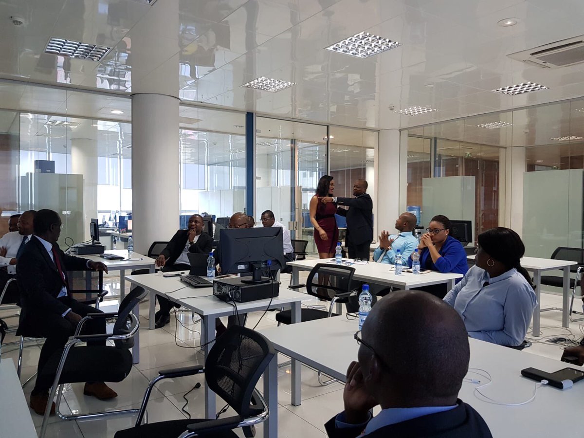 Okapi_Finance's tweet image. Gisèle Mwepu with the okapi team training Ecobank agents In DRC on the Okapi Finance system. #okapiDRC#bankingtheunbanked#financialinclusion@Okapi_Finance#womenintech#digitalinclusion