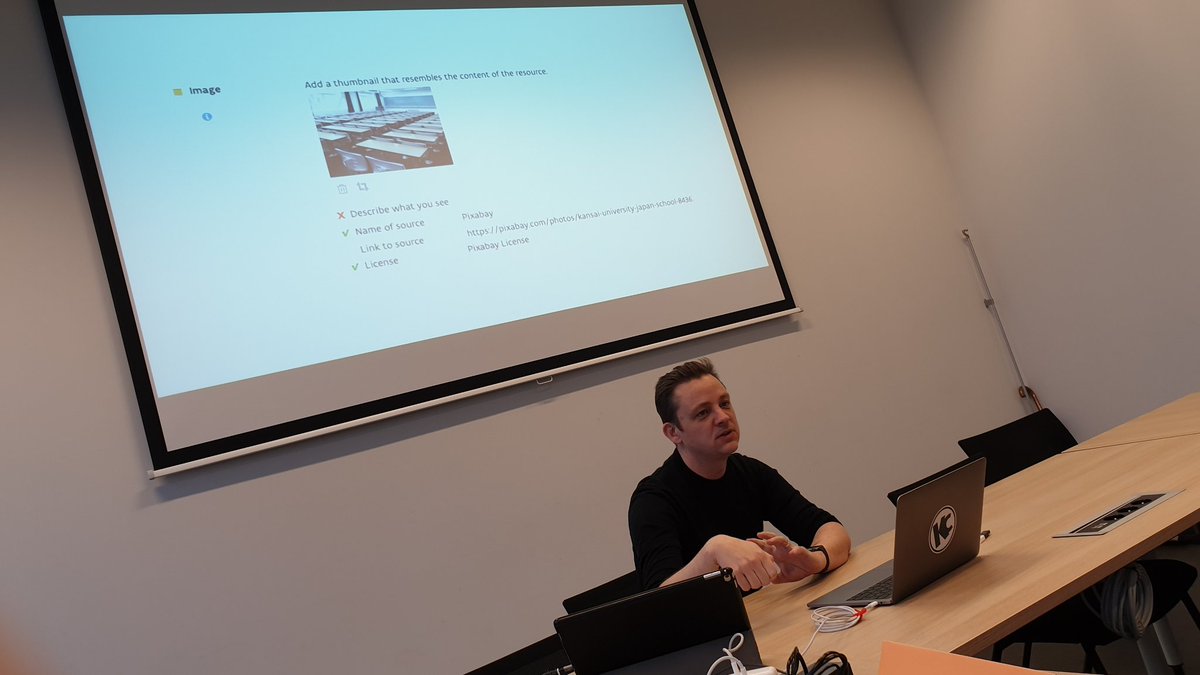 dj4am's tweet photo. "Describe what you see". I see @bramfaems showing the extra complexity we had to build into @KlasCement because of #accessibility. He's presenting at the #EdReNe seminar in Ghent to a very interesting international audience with lots of experience in #educational #repositories. https://t.co/gCioUQRz9R
