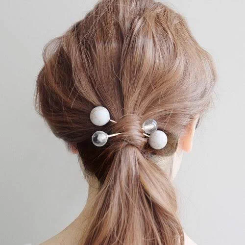 最近見るこのヘアアクセがハンターハンターのイルミのアレにしか見えない… 