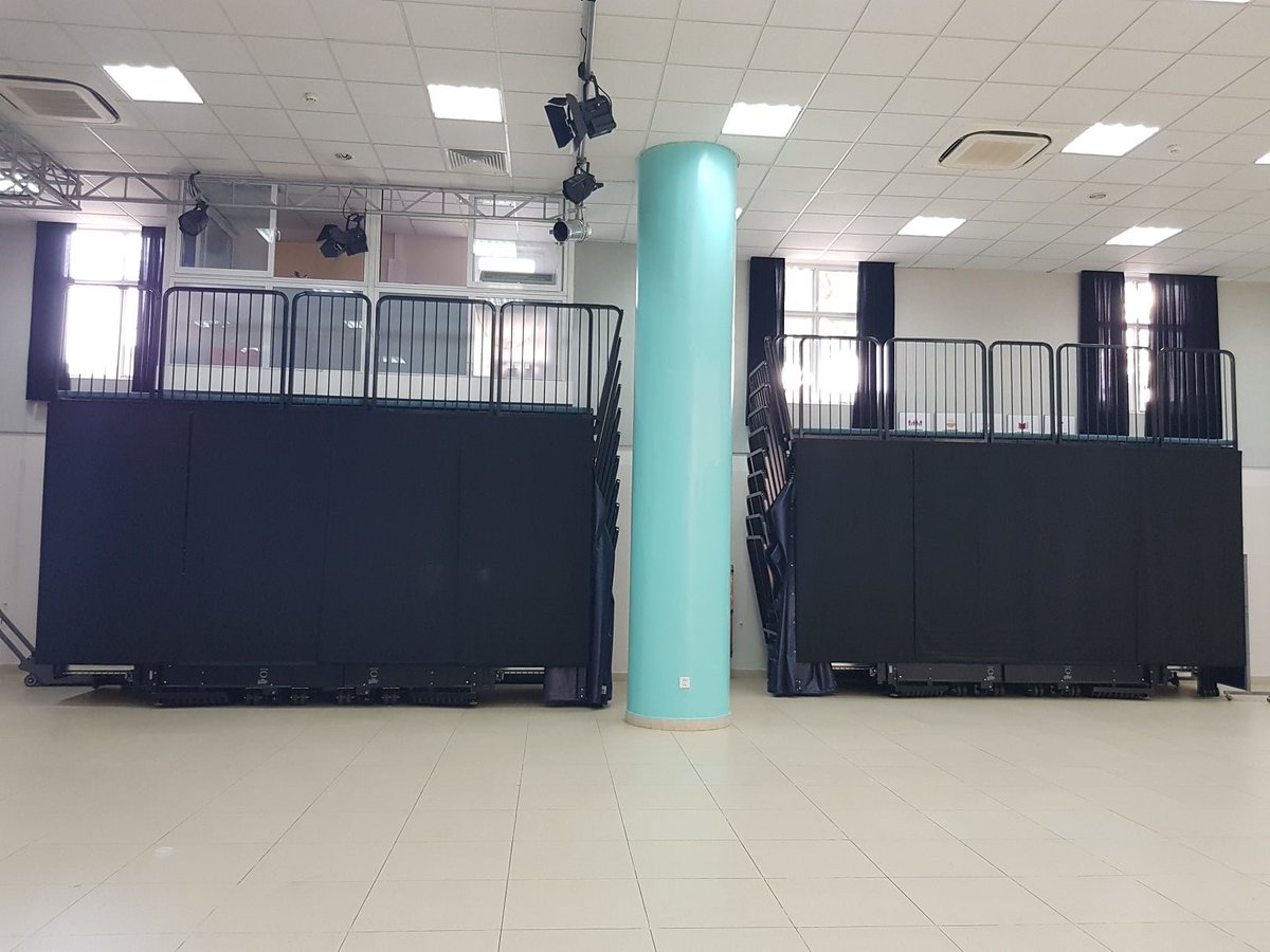 Do you have a multi-use venue that needs seating, but conventional wall attached retractable seating isn’t what you’re looking for? Consider using a portable solution like this one from BVIS Hanoi in Vietnam. Easily maneuvered by only two people and able to be stored discreetly.