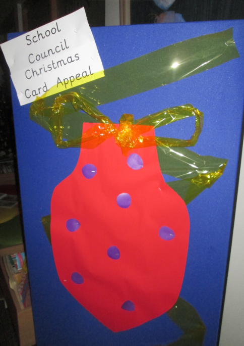 Pudsey_Primrose's tweet photo. Our School Council Christmas Card appeal is well under way. Children are invited to bring in a donation to our Christmas charities and write their christmas message on the boards around school - an alternative to all children sending individual christmas cards. #reducepaper https://t.co/ZSxvRIvmir