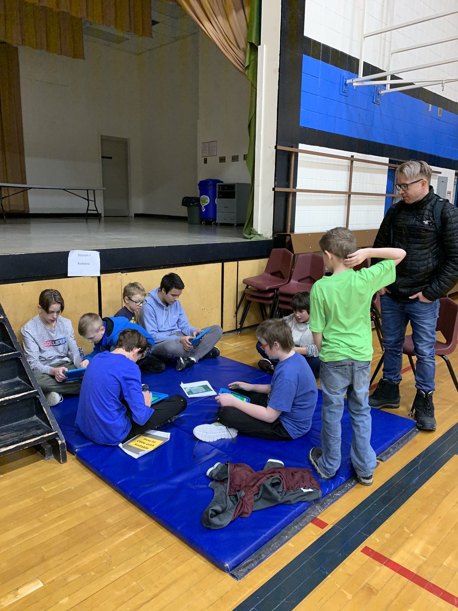 hgorrellclass's tweet photo. My Grade 2/3 class worked hard to prepare for the code-a-thon at our school. Here are some pictures of them teaching the older students how use some of the different coding activities. #HourOfCode #sls #ParkWestSD https://t.co/YeEh9YN8yI