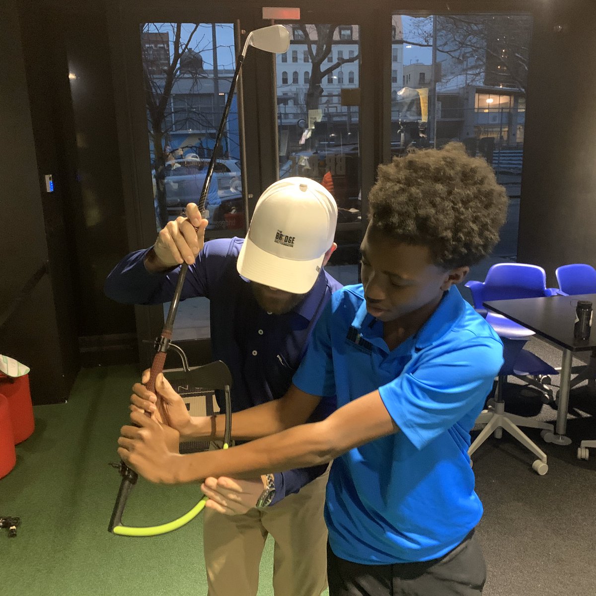 Teaching Professional Tyler Lower working with Horace Shelton on his swing path with a little help from theHANGER by Watson Golf. #bridgegolffoundation #bridgegolflearningcenter #harlem #juniorgolf #jrgolf <a href="/GreenlightGolf/">Tyler Lower</a>