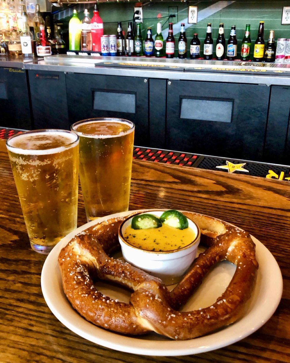 All star draft special two draft beers with a@pretzel and beer cheese for $10.  #doslagos #pretzel #corona #beer #craftbeer #NFL100 #BUFvsDAL