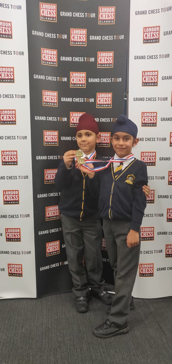 AtamAcademy's tweet photo. Congratulations to Zorawar and Jai for winning the Gold Medal for Year 2 in the London School Chess Championship at Olympia today.

The Gold Medal was presented by Maurice Ashley Grand Master Chess Champion. https://t.co/9wnKQmzSNn