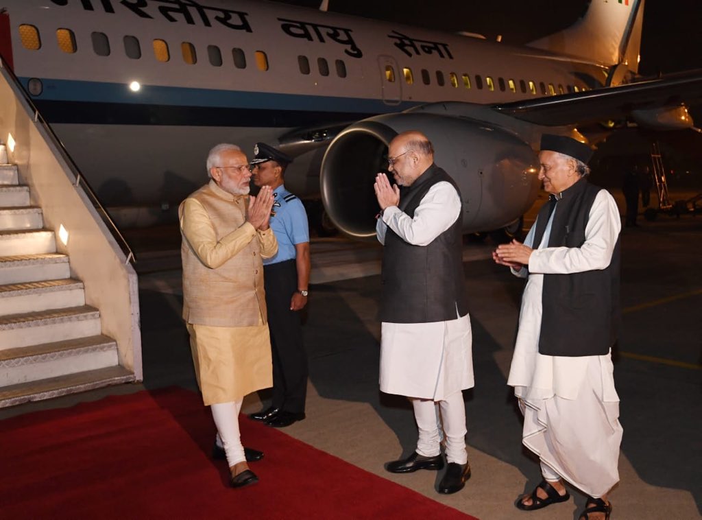 PMOIndia's tweet photo. The Prime Minister landed in Pune. He will take part in the DGP and IGP Conference in the city. 

Home Minister @AmitShah, Maharashtra Governor @BSKoshyari, CM Uddhav Thackeray, former CM @Dev_Fadnavis and other dignitaries welcomed him at the airport. @OfficeofUT https://t.co/OW0h9ZrPoC