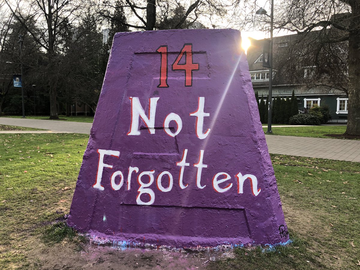 Purple cairn reading “14 not forgotten”