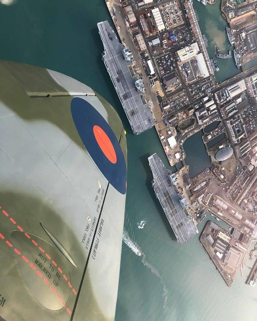 The best of the old and the best of the new... We're used to working with rather newer <a href="/RoyalAirForce/">Royal Air Force</a> and <a href="/RoyalNavy/">Royal Navy</a> aircraft, but when a Spitfire dips its wings to you, that's quite special. <a href="/HMSQNLZ/">HMS Queen Elizabeth</a> <a href="/HMSPWLS/">HMS Prince of Wales</a>