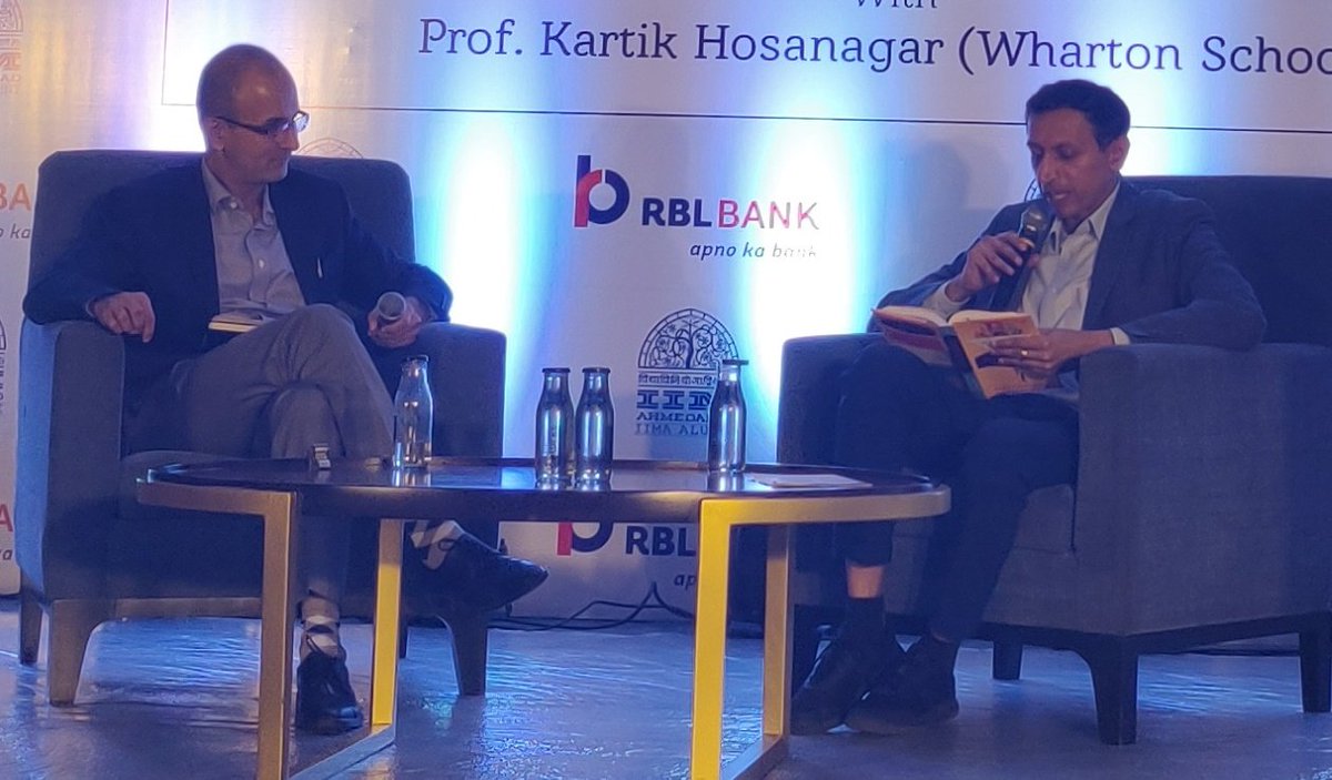 sherryrawla's tweet image. It was great listening to @KHosanagar on #AI. For a lay nontechie like me, it was an easy breezy session laced with life anecdotes &amp;amp; easy concepts like the #cobraeffect. Kartik is seen here reading a fascinating excerpt on #AlphaGo from his book. Nicely moderated by @DpakJraman
