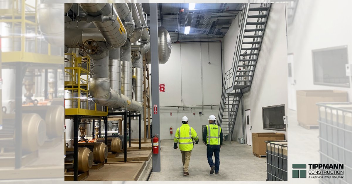 TippmannGroup's tweet photo. Two of our Project Managers taking a stroll through the largest thermal fluid room in the world that we had the honor of building. They are admiring their completed work and a job well done! #ColdStorageExcellence #ColdStorageConstruction https://t.co/4TAQtczuuY