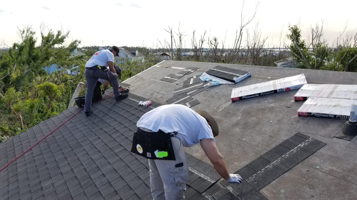 heart911team's tweet photo. #GreenTurtleCay - HEART 9/11 volunteers from #IBEWLocal3 are repairing and rebuilding roofs destroyed by #HurricaneDorian. Since September 6 HEART 9/11 has deployed over 100 expertly skilled volunteers to help wherever help is needed. #GTCstrong https://t.co/LVtaEjHyk7